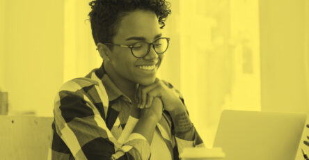 Woman smiling because she found the best alternatives to Toptal.