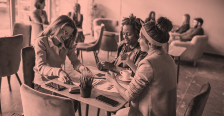 Small team discussing content marketing services they need to complete their projects.