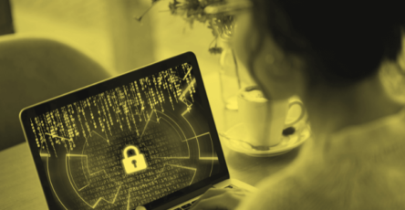 A cyber security consultant working on her computer.