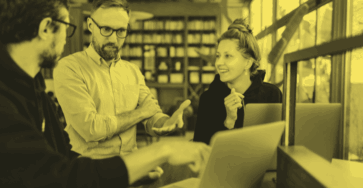 Business owners discussing the best sites similar to Upwork.