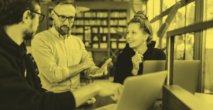 Business owners discussing the best sites similar to Upwork.