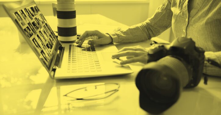 A freelance photo editor working.