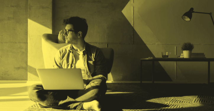 A PPC freelancer is working in his living room.