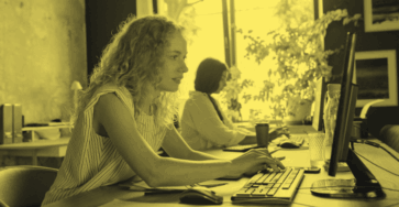 A freelance marketing automation specialist working on her computer.