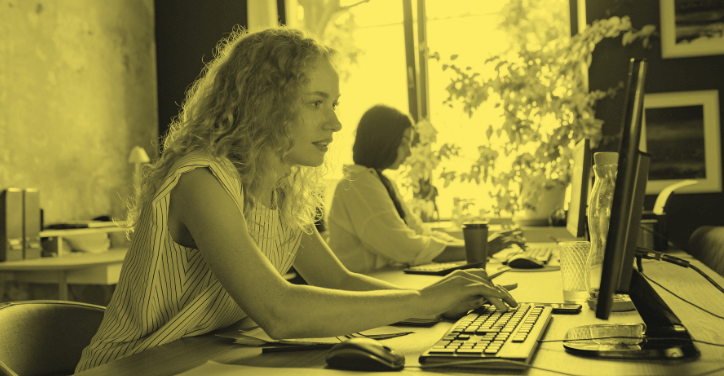 A freelance marketing automation specialist working on her computer.
