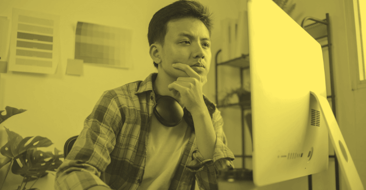 A digital marketing strategist working on their computer