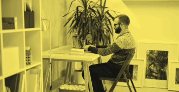 A CRM specialist working at their desk.