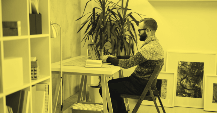 A CRM specialist working at their desk.
